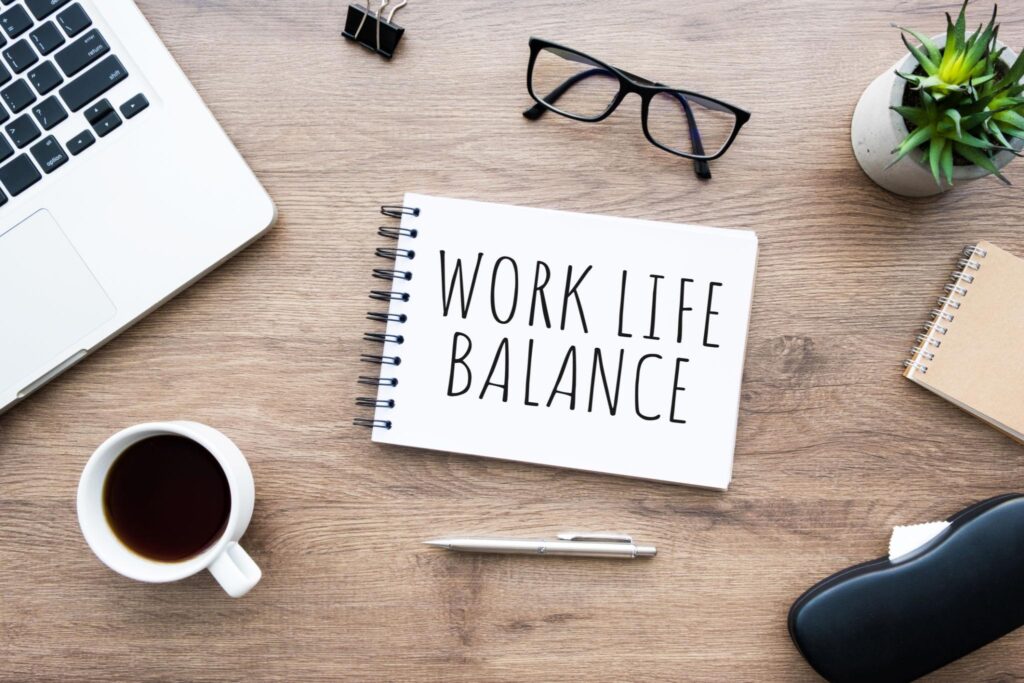 Work-life balance workspace with laptop and coffee